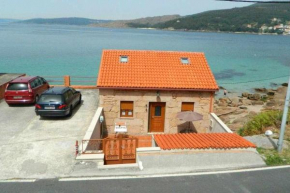 Casita con terraza al lado del mar en O Pindo